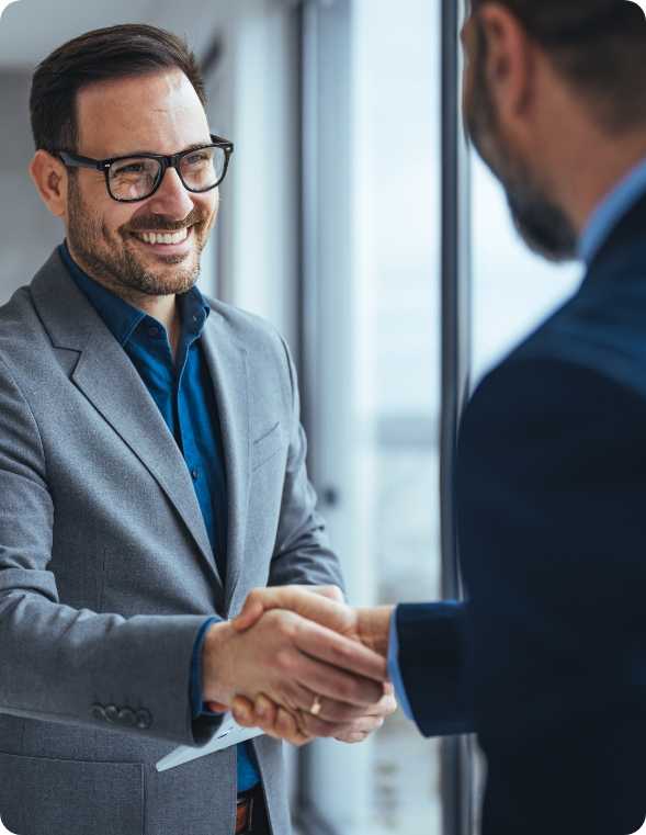 Pinnacle team members shaking hands